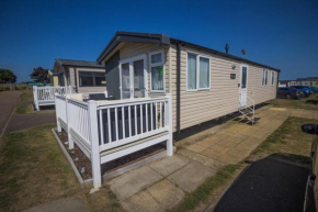 Lovely caravan with decking at Caister Haven, nearby the beach ref 30041R